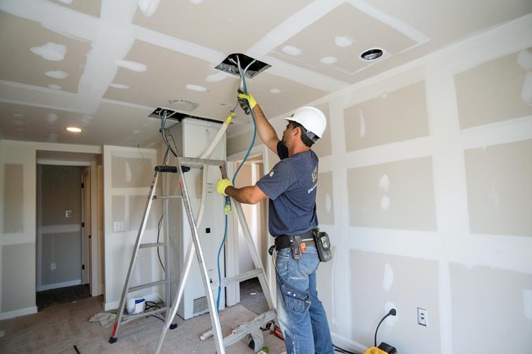 Big O technician performing Remodels & Additions